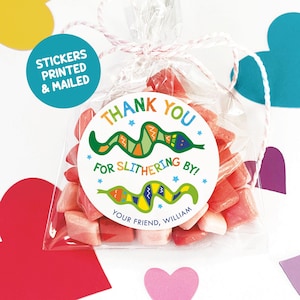 May include: A round sticker with a colorful snake design and the text "Thank you for slithering by!" and "Your friend, William".