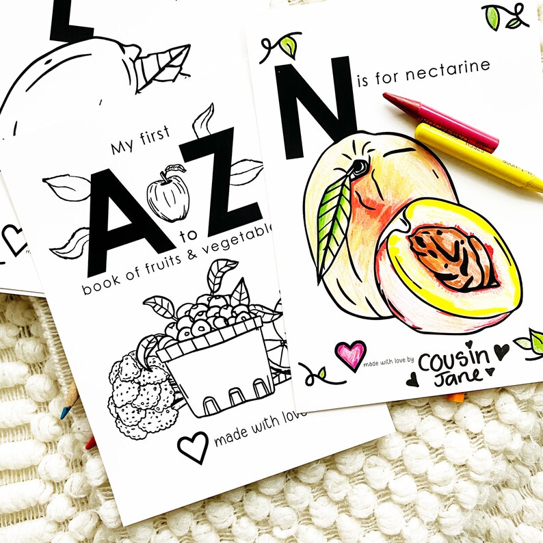 May include: Black and white printable coloring pages for a book of fruits and vegetables. The pages feature the letters A and N, with illustrations of an apple and a nectarine. The text "My first A to Z book of fruits & vegetables" and "N is for nectarine" are included on the pages.