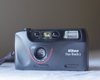 Nikon Fun Touch 2 35mm Camera: Retro film point-and-shoot with 34mm lens, auto focus