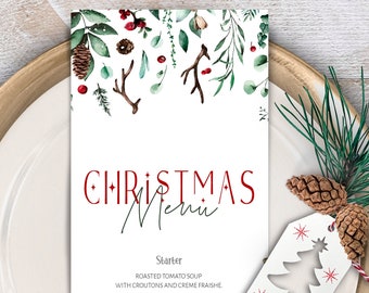 May include: A printable Christmas menu template with a watercolor design of greenery, berries, and antlers. The menu includes a starter, main course, and dessert. The text reads "Christmas Menu".
