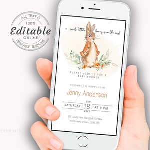 May include: A digital phone screen displaying a baby shower invitation with a watercolor illustration of a bunny rabbit wearing a brown jacket. The invitation text reads "A sweet little bunny is on the way!" and includes the date, time, and location of the shower. The text also says "Please join us for a baby shower honoring the mommy-to-be Jenny Anderson."