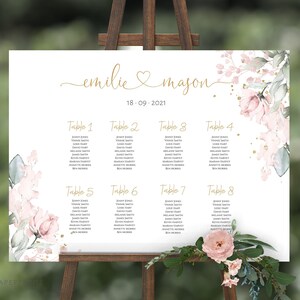 Puede incluir: Un plano de asientos de boda con un diseño floral con flores de acuarela rosa y verde. El gráfico está titulado "emilie & majon" con la fecha "18-09-2021". El gráfico enumera las mesas del 1 al 8 con los nombres de los invitados.