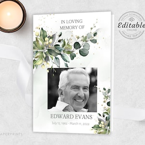May include: A printable memorial card with a black and white photo of a man. The card has a green and white floral design with gold glitter accents. The text reads "In loving memory of Edward Evans, July 15, 1962 - March 11, 2022".
