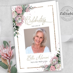 May include: A printable funeral program template with a gold frame and pink protea flowers. The template features a photo placeholder, the text "Celebrating the Life of", and space for the deceased's name and dates.