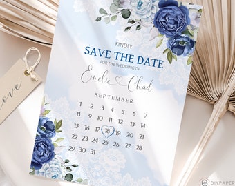 May include: Blue and white floral save the date card with a lace pattern and a calendar with the date September 18th circled. The text reads "Kindly Save the Date for the Wedding of Emelie & Chad".