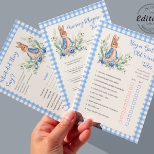 Puede incluir: Tarjetas de juego para baby shower con borde de cuadros azules. Las tarjetas presentan una ilustraci&oacute;n de acuarela de un conejito con una chaqueta azul y detalles florales. El texto incluye "What did they Say?" y "Boy or Girl? Old Wives Tales."