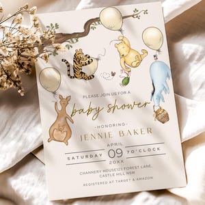 May include: A baby shower invitation with illustrations of Winnie the Pooh characters, balloons, and a tree branch. The invitation text reads "Please join us for a baby shower" and includes the honoree's name, date, and location.