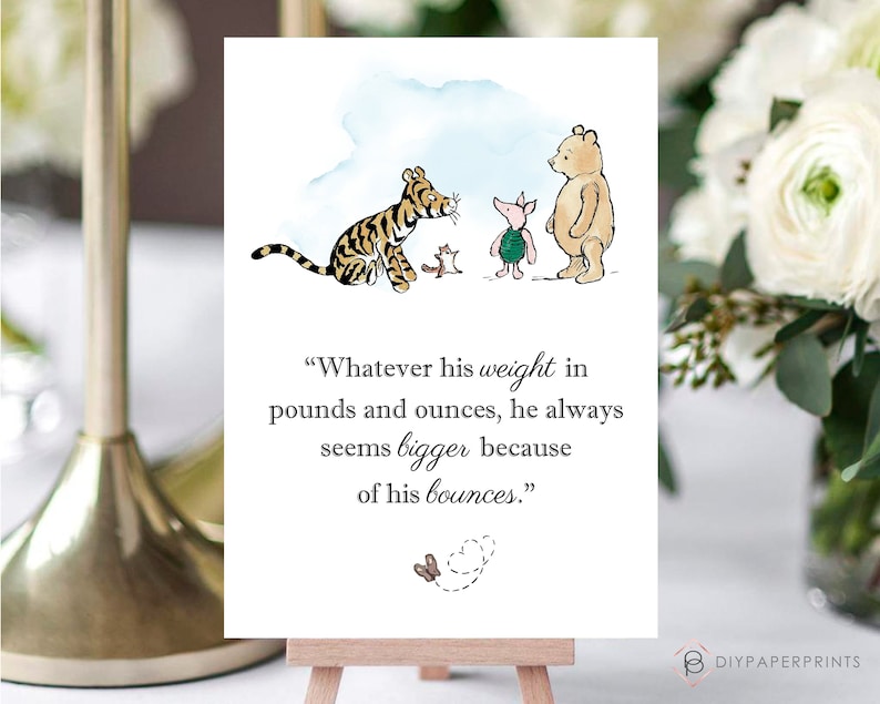 May include: A white card with a watercolor illustration of Winnie the Pooh characters, including Tigger, Piglet, and Pooh Bear. The card features the quote: "Whatever his weight in pounds and ounces, he always seems bigger because of his bounces."