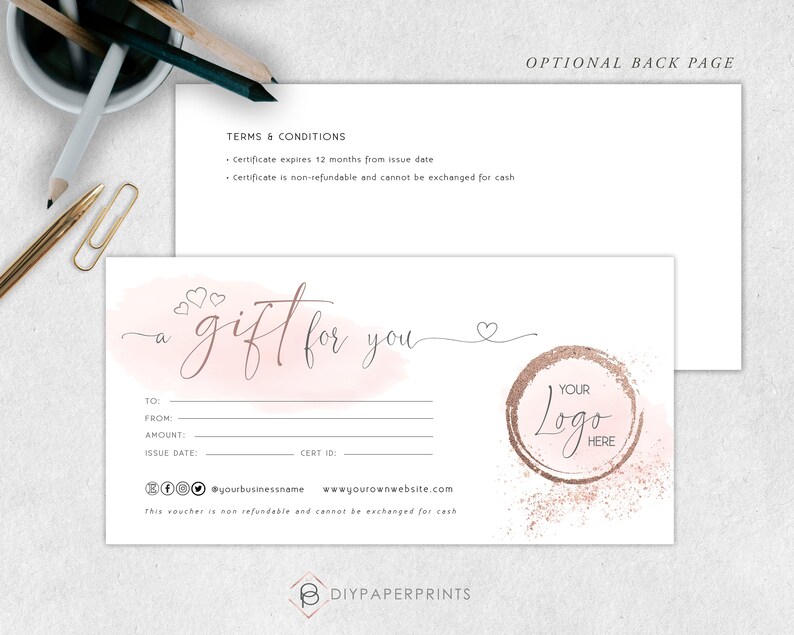 May include: A pink and white watercolor gift certificate template with the text "a gift for you" in cursive. The template includes fields for "To", "From", "Amount", "Issue Date", and "Cert ID". The bottom of the template includes social media icons, a business name, a website address, and the text "this voucher is non refundable and cannot be exchanged for cash". The template also includes a circle with the text "YOUR Logo HERE" in a gold glitter design.