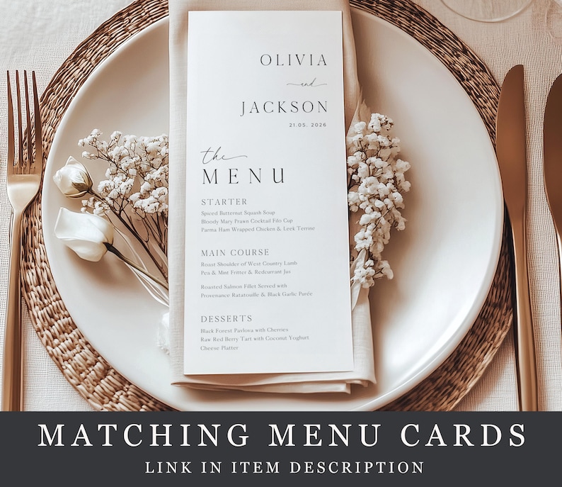 May include: A wedding menu card with the names Olivia and Jackson, and the date 21.05.2026, on a white plate with a gold fork and knife. The menu card is on a white napkin with floral accents. The text "The Menu" is visible.