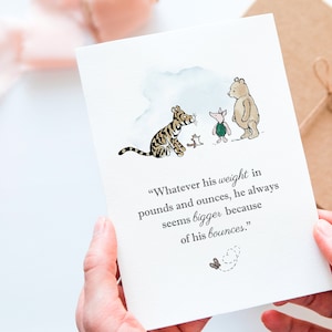 May include: A greeting card featuring a watercolor illustration of Winnie the Pooh characters. The card includes a quote about weight and bounces. The characters include a tiger, piglet, bear, and a small butterfly.