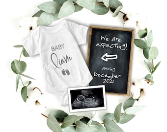 May include: A white onesie with the text "Baby Liam" and a pair of footprints. A chalkboard sign reads "We are expecting!" with an arrow pointing left and the text "arriving December 2021". A black and white ultrasound image is also included.