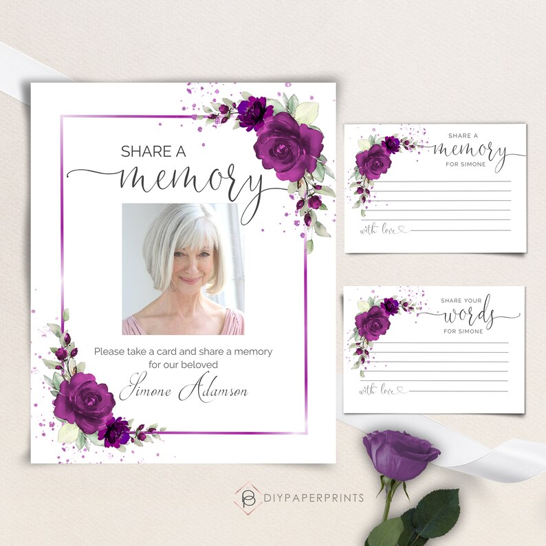 May include: Purple floral memorial cards with a photo frame and space to write memories and words for Simone. The cards have a watercolor background with purple flowers and white text.