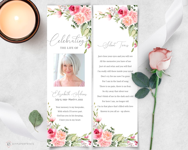 May include: A floral funeral program with a photo of a woman and the text "Celebrating the Life of Elizabeth Adams July 15, 1959 - March 11, 2022" and "Your memory is my keepsake, With which I'll never part. God has you in his keeping. I have you in my heart." on the left side. The right side features the text "Silent Tears" and a poem about remembering a loved one.