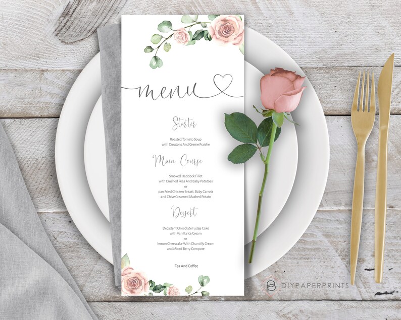 May include: A printable wedding menu template with a floral design. The menu features a heart symbol and the word "menu" in cursive. The menu lists the following items: Starter, Roasted Tomato Soup with Croutons and Cr&egrave;me Fraiche; Main Course, Smoked Haddock Fillet with Crushed Peas and Baby Potatoes or Pan Fried Chicken Breast, Baby Carrots and Chilled Creamed Mashed Potato; Dessert, Decadent Chocolate Fudge Cake with Vanilla Ice Cream, Lemon Cheesecake with Chantilly Cream and Mixed Berry Compote; Tea and Coffee.