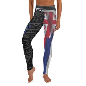 May include: Yoga leggings with a split design. One leg features a black and gray tribal pattern with blue accents, while the other leg displays a red, white, and blue flag design. The leggings are high-waisted and form-fitting.