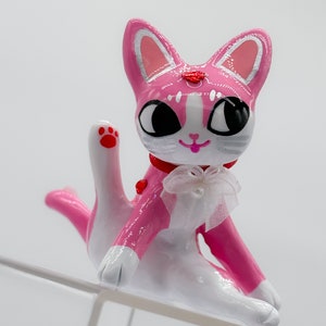 Strawberry the lucky cat sculpture