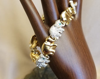 Charming Gold tone and Rhinestone Elephant link bracelet