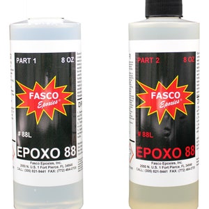 May include: Two clear plastic bottles labeled "EPOXO 88" with red and black text. The bottles are labeled "Part 1" and "Part 2" and contain 8 ounces of epoxy resin.