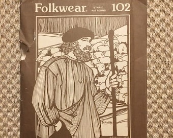 May include: A vintage sewing pattern for a French Cheesmaker's Smock, Folkwear pattern number 102. The pattern features a line drawing of a man wearing the smock, standing in a field of sheep.