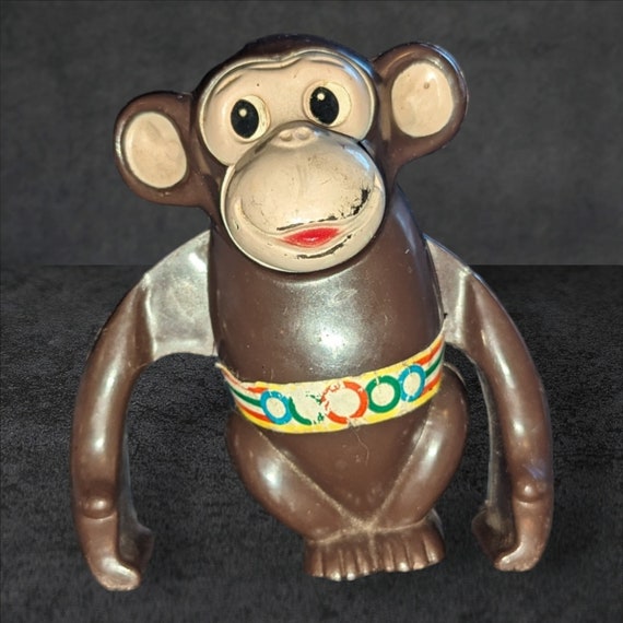 Vintage Plastic Wind-Up Olympic Side-Walking Arm Ape Monkey Toy