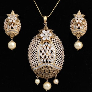 Oval Shaped American Diamond Pendant with White CZ Stone and Faux pearl for Women