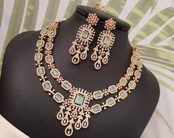 Gold plated american diamond mint green necklace and earring set | two layer ad