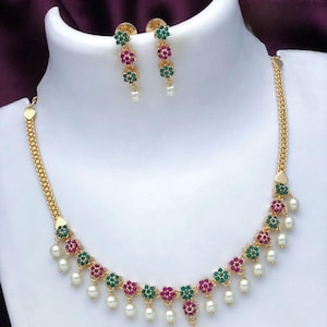 American diamond multi-color stone necklace and earring set| gold plated floral design simple necklace| bollywood style cz set| gift for her