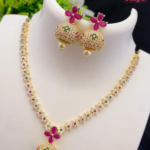 American Diamond Necklace Exclusive Design Floral Emerald Pendant ...