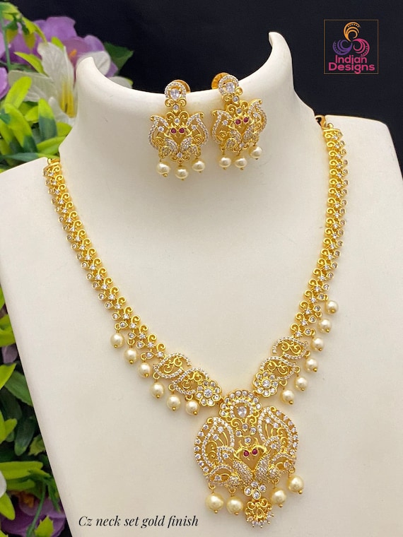 IndianDesignz Unique Design American Diamond Necklace Set Gold Plated Emerald Ruby Ad Necklace with Pearl Hangings South Indian Style Wedding Jewelry