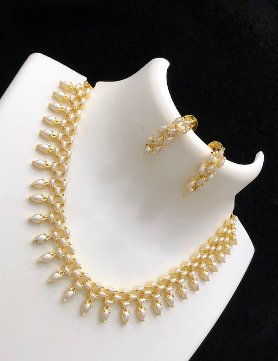 IndianDesignz Gold Plated Simple Daily Wear American Diamond Pearl Choker Necklace Earring Set Pearl and Crystal Choker South Indian Jewelry Gold Choker