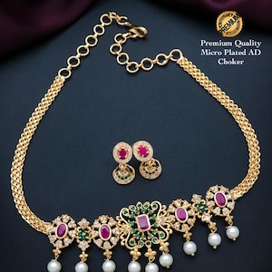 South indian gold choker necklace designs| small gold choker necklace designs with pearl drops and ad stones| american diamond necklace