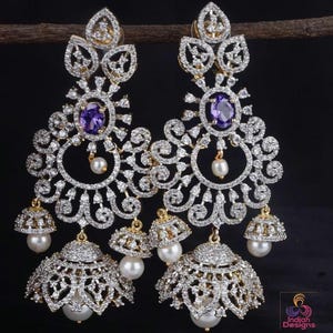 American diamond jhumka earrings| cz american diamond long jhumka drop earrings| ruby green purple stone jhumkis| indian party wear earrings