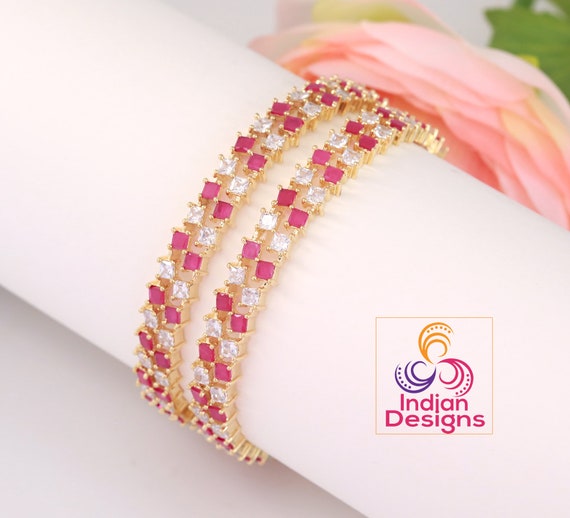 White stone studded gold bangles clearance