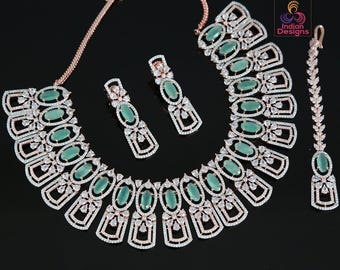 Rose gold american diamond necklace jewelry | earring mang tikka set | in pink-mint green oval stones studded with real teardrop crystals