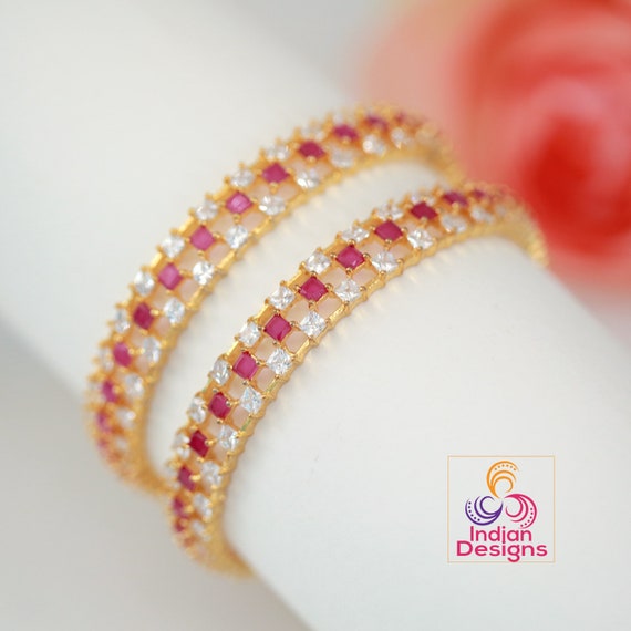 Red gold tone stone bangles discount