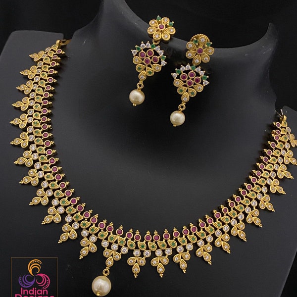 Gold-Tone Ruby and Emerald Choker Necklace Set with Pearl Drops and Matching Earrings| traditional South Indian style matte finish necklace