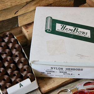 Vintage Box of 137 HemBobs, Brown Nylon Pre-Wound Bobbins