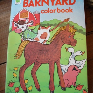 May include: A vintage children's coloring book with a red barn, a horse, a cow, a chicken, and a pig. The cover features the title "BARNYARD color book" and the price "69&cent;".