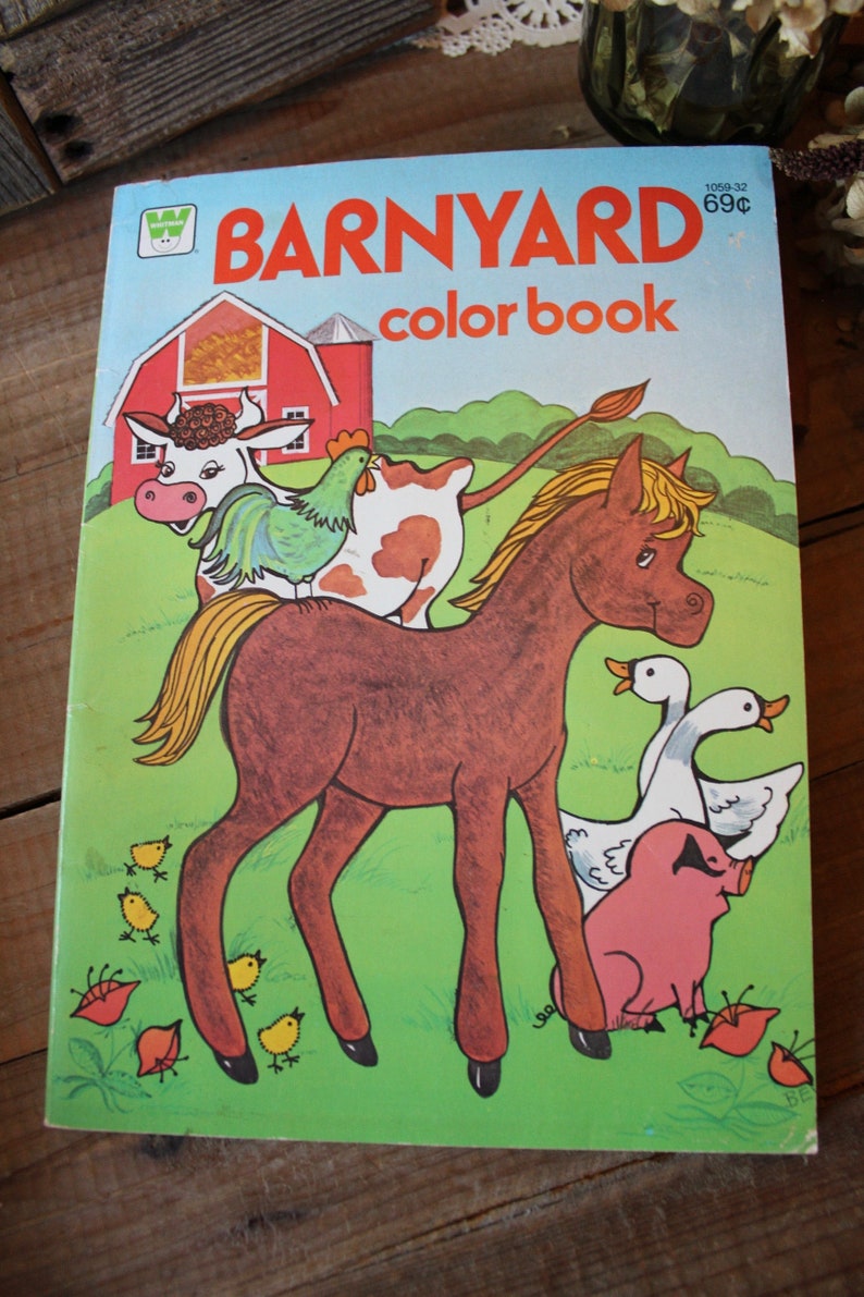 May include: A vintage children's coloring book with a red barn, a horse, a cow, a chicken, and a pig. The cover features the title "BARNYARD color book" and the price "69&cent;".