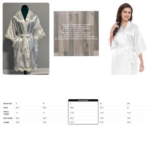 May include: A white satin robe with lace trim. The robe has a sash tie and long sleeves. The robe is displayed on a mannequin. A size chart is shown below the image. The chart shows the measurements for chest, sleeve length, length, and belt length in inches for sizes S, M, L, XL, and 2XL. The text 'Recommended' is above the chart.