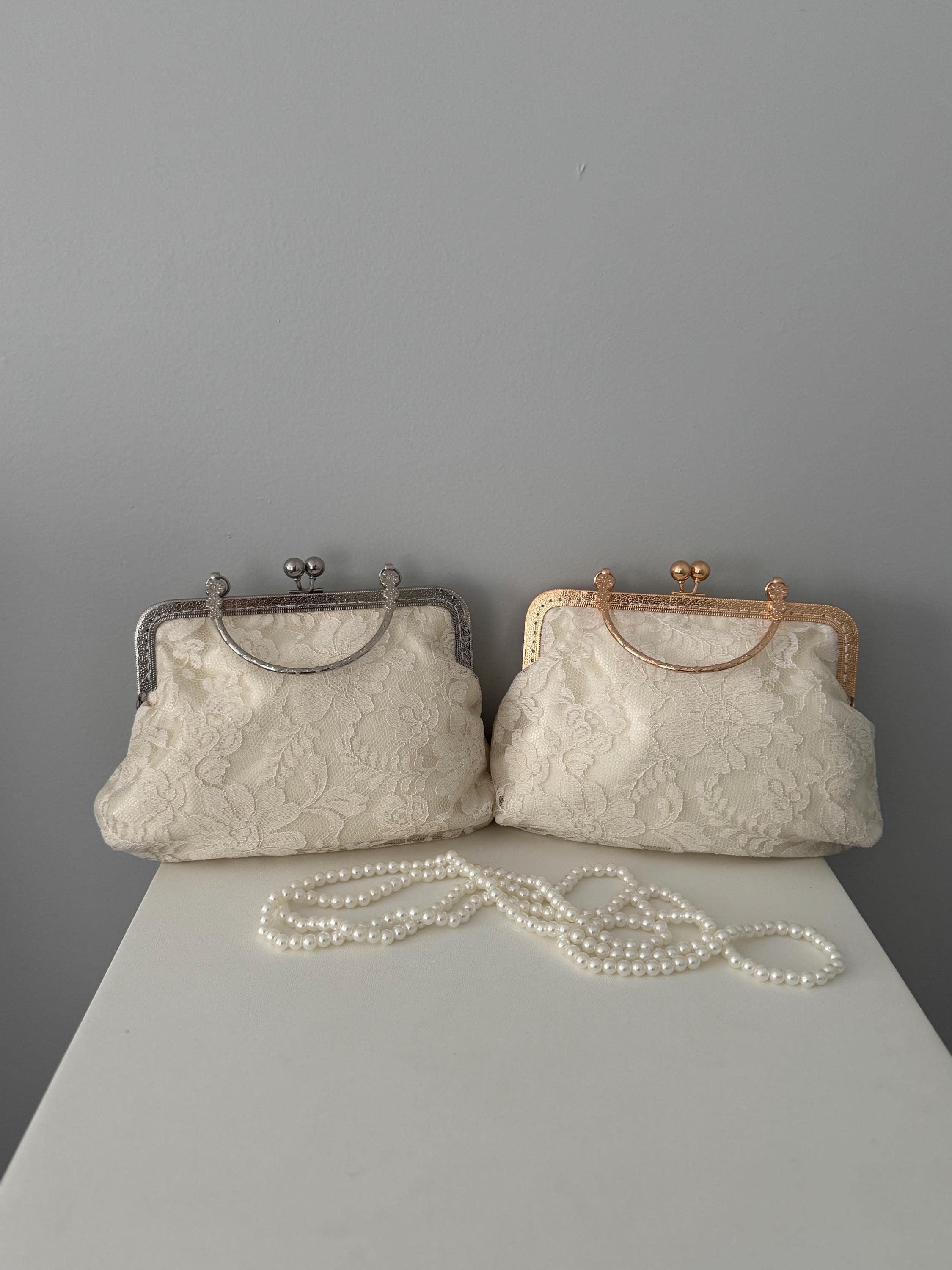 Silver Bow Clutch - Etsy VINTAGE ivory clutch purse with silver hardware snap closure main image 0