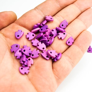 Branelli di fascino di pesce in ceramica, ciondoli di perline di ceramica per la creazione di gioielli, piccole perle di pesce Perline