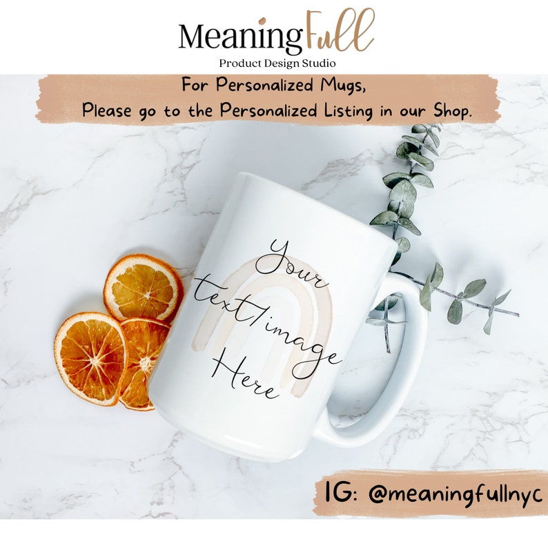 May include: White ceramic mug with a rainbow design and the text "Your text/image Here." The mug is part of the "Meaning Full Product Design Studio" collection. The image also includes dried orange slices and greenery.