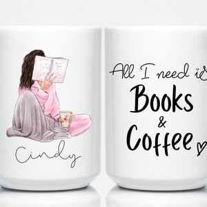May include: White ceramic mug with a wraparound design. One side features an illustration of a person reading a book, with the name "Cindy" below. The other side says "All I need is Books & Coffee" with a heart symbol.