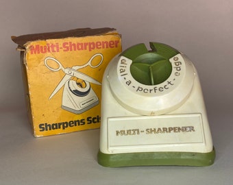 K-Tel マルチシャープナー。1970 年代のレトロなキッチンツール