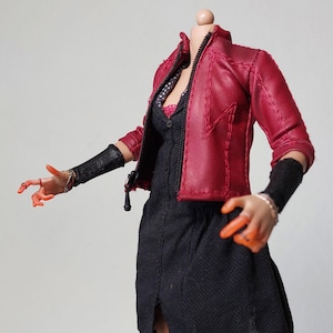 May include: A headless action figure torso wearing a dark red textured jacket with visible stitching, a black button-down dress with a subtle pattern, and black wrist cuffs. The figure has orange-toned hands with articulated fingers and silver rings.
