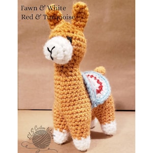 May include: A crocheted llama in fawn, white, red, and turquoise. The llama has a white face and feet, with a turquoise and red saddle. The text "Fawn & White Red & Turquoise" is above the llama. The logo "ELS Custom Works" is in the bottom left corner.