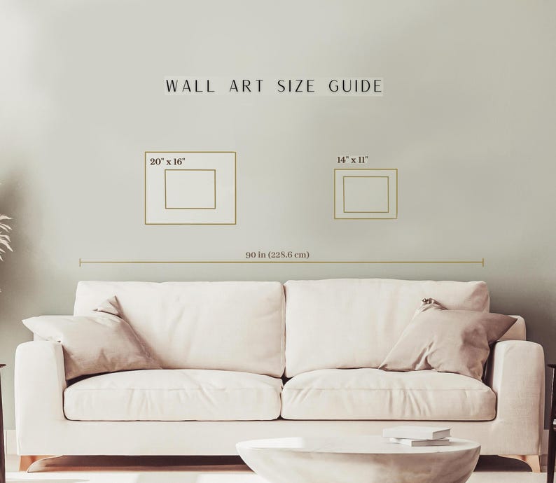 Pode incluir: Um guia de tamanhos de arte de parede com o texto "WALL ART SIZE GUIDE". O guia mostra dois ret&acirc;ngulos emoldurados rotulados "20" x 16"" e "14" x 11"". Uma linha horizontal abaixo &eacute; rotulada "90 in (228,6 cm)".