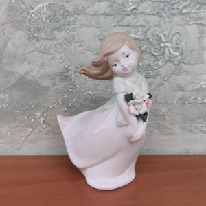 Vintage Porcelain Girl Figurine: Flower Bouquet Statuette